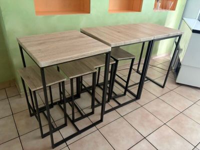 three tables that are sitting next to each other