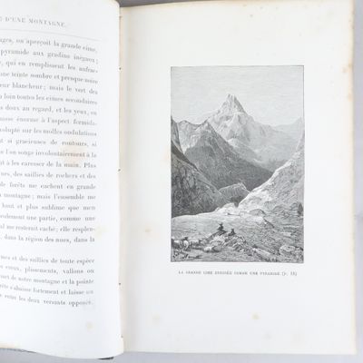 un livre ouvert avec l'image d'une montagne au milieu