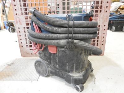 an image of a vacuum cleaner with a bunch of hoses on it