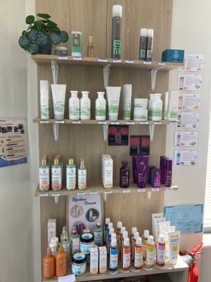 a shelf with many different types of skin care products on it