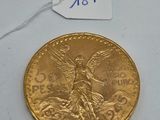 a close up of a gold coin with a price tag on it