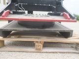 a picture of the back end of a truck with a box on it