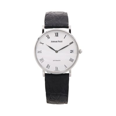 an image of a black and white watch with roman numerals