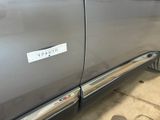 a close up of a car with a sticker on the door