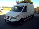 a white van that is parked in a parking lot