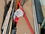 a box full of baseball bats and other baseball equipment