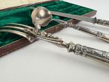 a silverware set in a case with a spoon and a knife