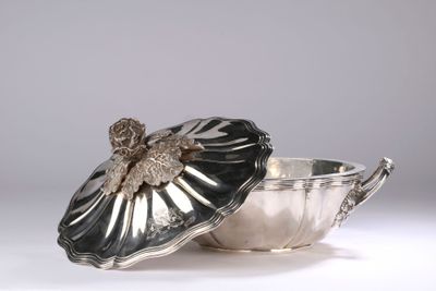 silver plated bowl with lid and flower decoration on it