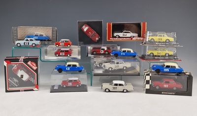 many different models of cars in a display case