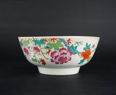 a close up of a bowl on a table with a black background