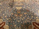 an image of a large oriental rug on a wooden floor