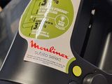 a close up of a blender with a sticker on it