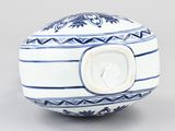 blue and white porcelain ball with a blue and white design on it