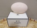 chanel no 5 soap in a box on top of a basket