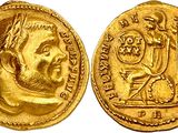 a gold coin with an image of a man and a woman on it