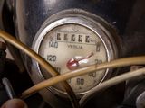 a close up of a gauge on a motorcycle