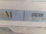 a close up of a mattress with a label on it