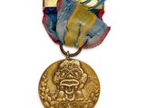 une image représentant une médaille d'or ornée d'un ruban bleu et d'un singe
