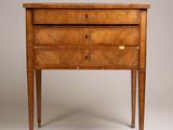 an image of a wooden chest of drawers with a drawer on one side and a drawer on the other