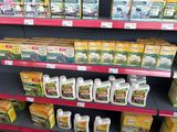 many different types of products on the shelves in the store