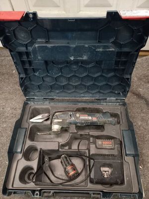 a tool in a case that is open on the floor