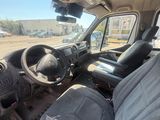 the interior of a truck with the driver ' s seat up