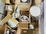 many boxes of different types of lighting on the floor