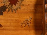 an image of a wooden box with a star design on it