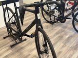 a bike that is sitting on a stand in a store