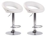 pair of white bar stools with chrome base and foot rest