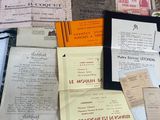 many different types of papers on the table