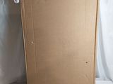 a cardboard box that is sitting on a white surface