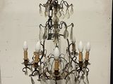 a chandelier with a bunch of lights hanging from it