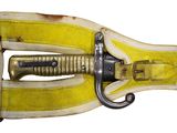 a close up of a sword with a yellow strap on it