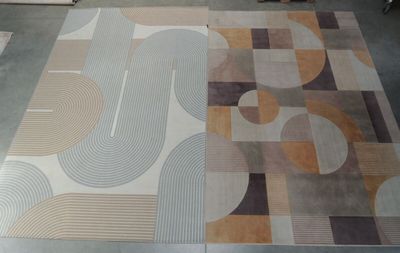 a picture of a room with a rug on the floor and a rug on the floor