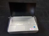 a laptop computer sitting on top of a bag