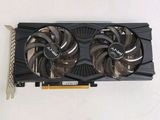 a close up of a video card with a fan attached to it