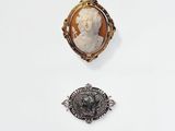 two rings with a cameo of a man and a woman on them
