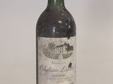 a bottle of wine that is sitting on a table