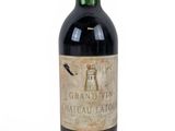 a bottle of wine that is sitting on a table