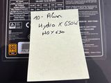 a post it note on the side of a laptop
