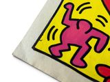 graffiti painting of a man and a woman dancing on a yellow background