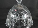 a clear glass dome with a decorative pattern on it