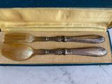 three spoons and two spoons in a box