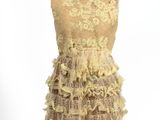 an image of a dress on a mannequin on a white background