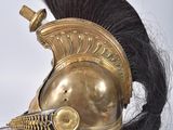 an image of a helmet with a long hair on top of a wooden stand