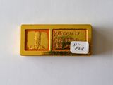 un petit lingot d'or muni d'une étiquette indiquant son prix