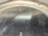 a close up of a metal pan with a lid on a table