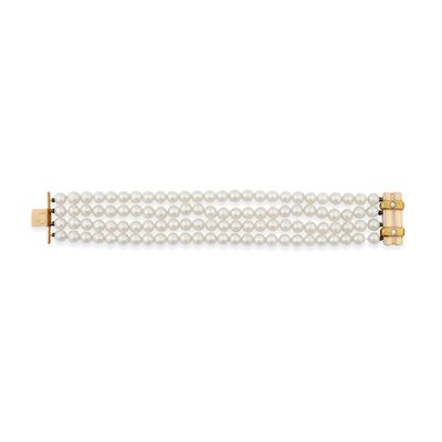 a pair of cultured pearl and diamond bracelets