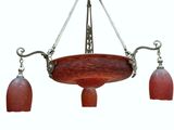 a picture of a chandelier with three lights hanging from it